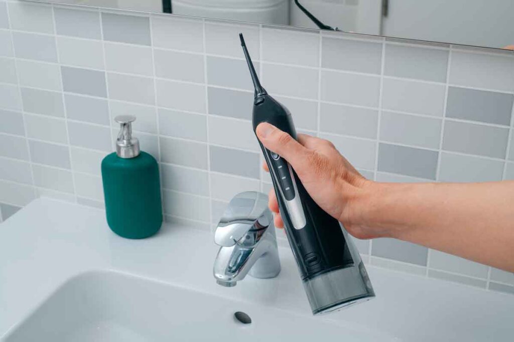irrigador dental